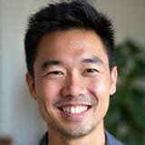 Portrait of Liam Chen, a compassionate and experienced licensed therapist.